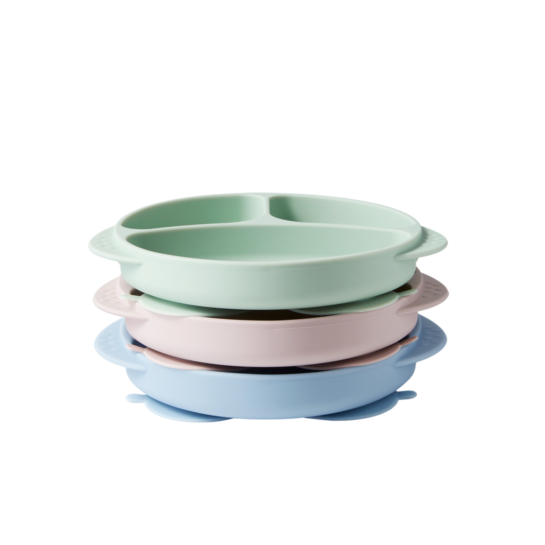 Three owl-shaped silicone suction plates (pink, green, blue) with dusk-proof lids on a clean white background