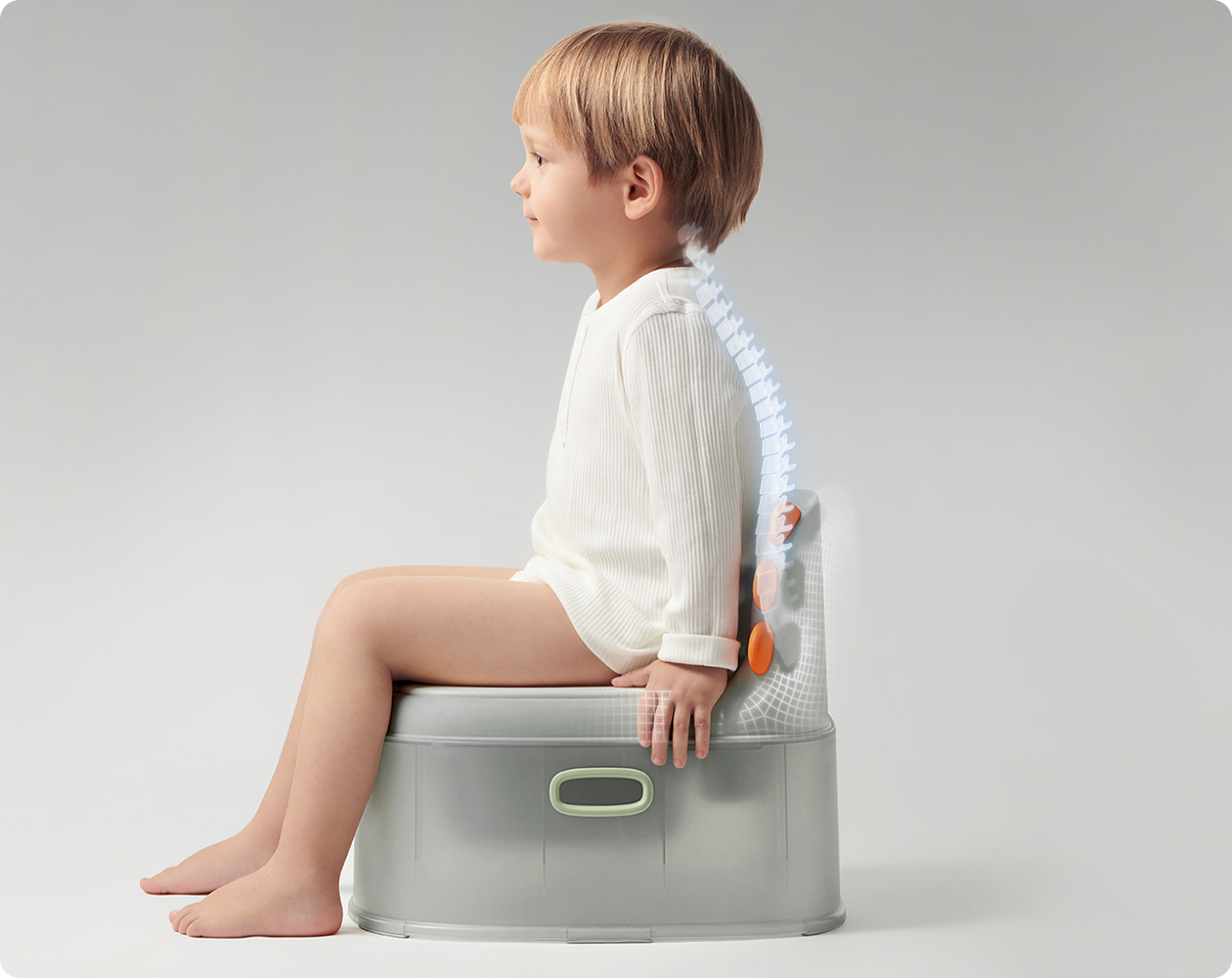 Child seated on the Bc Babycare Potty Chair with an ergonomic backrest and soft PU cushion.