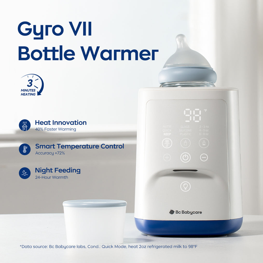 This image shows the bc babycare Gyro VII Bottle Warmer. The device has a digital display showing “98°F”, with a baby bottle on top and a small container beside it. It features a clean design, mainly white with a blue base. Text and icons on the front highlight its functions. The background is light and simple.