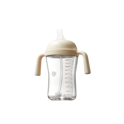 Beige Tilted Anti-Spill Sippy Cup in neutral tones, featuring ergonomic design for healthy posture