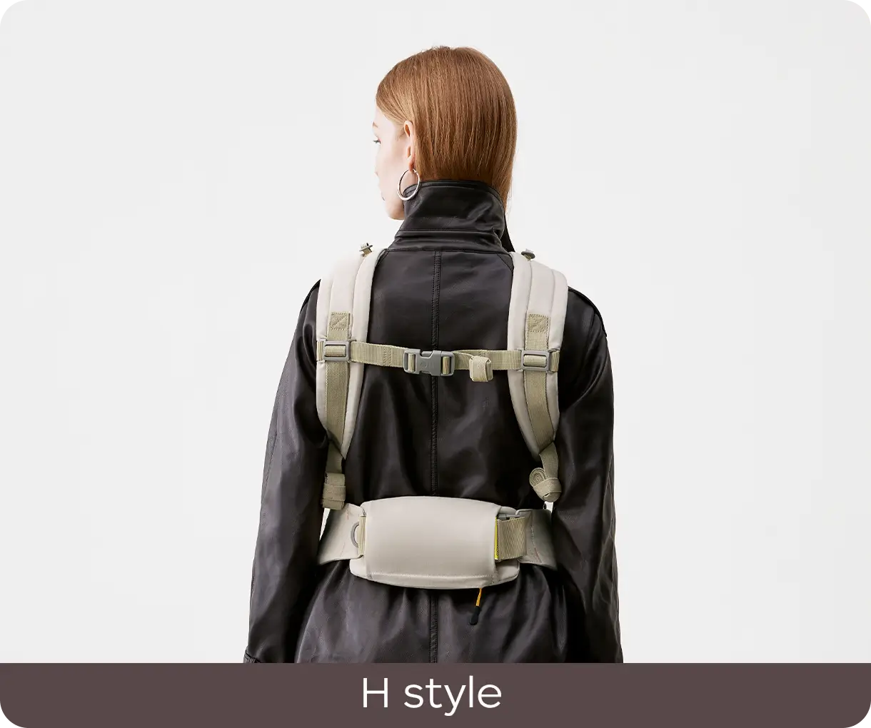 Rear view of the CocoonGo Baby Carrier worn with H-style shoulder straps.