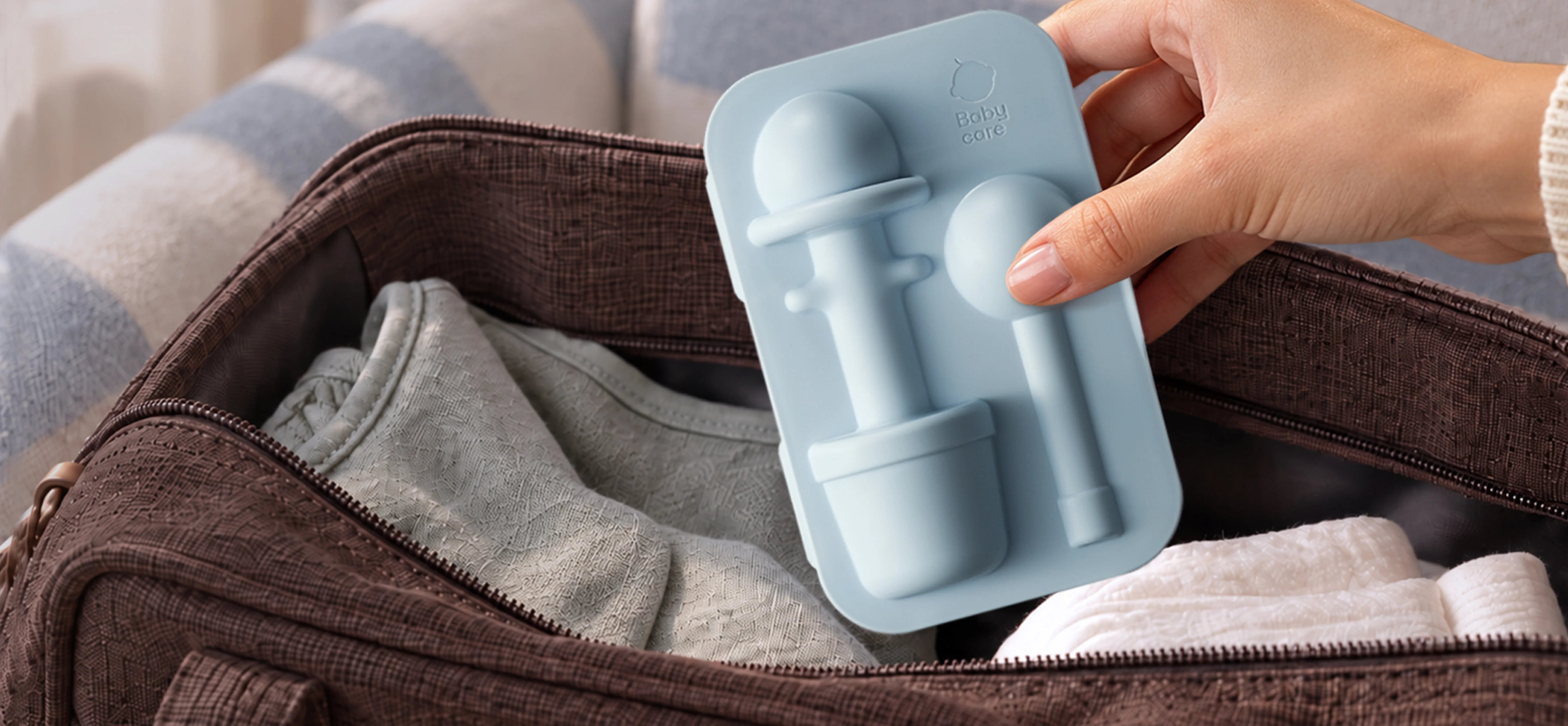 NouriPod baby medicine dispenser stored in its protective case for organized travel and on-the-go use.