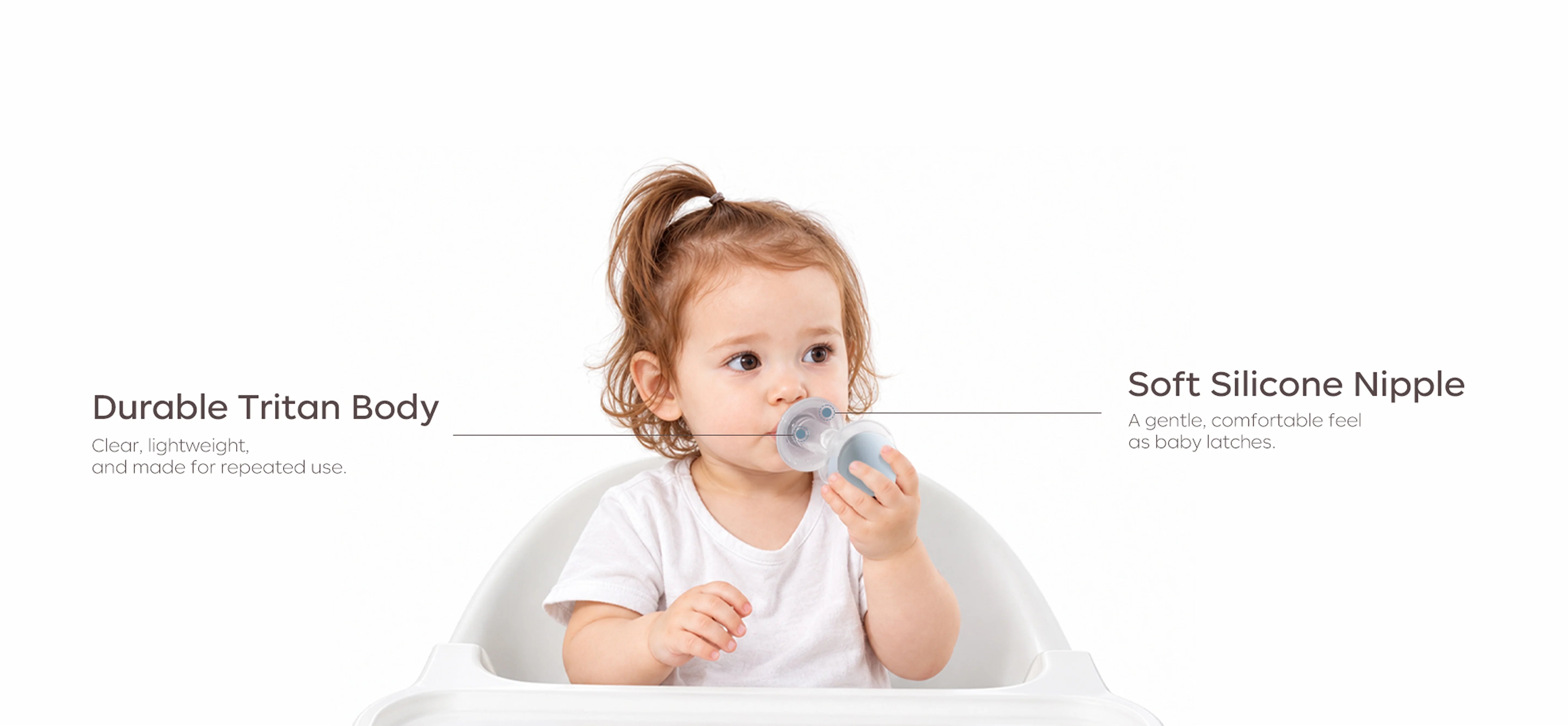 Infant using the NouriPod medicine dispenser made with a durable Tritan body and soft silicone nipple.
